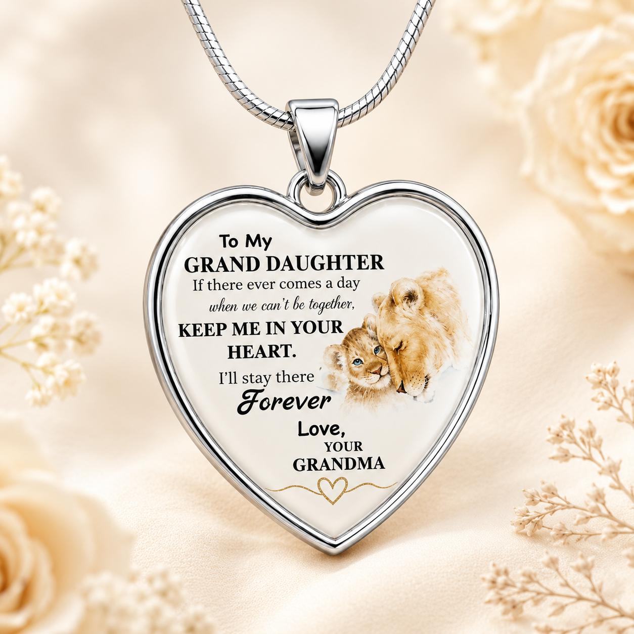 To My Granddaughter heart necklace with loving message from grandma and lion cub artwork