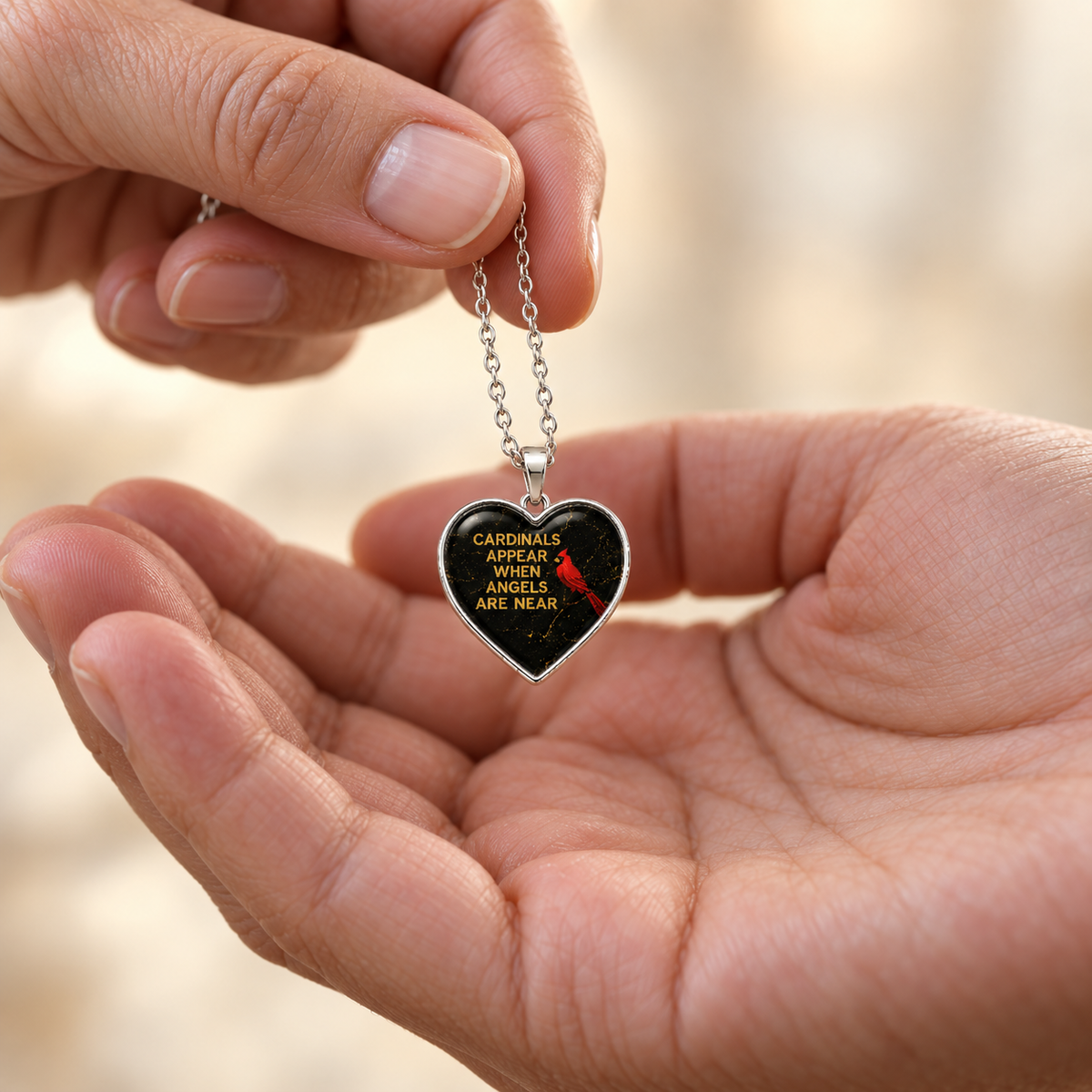 Heart-shaped cardinal memorial necklace with the message Cardinals Appear When Angels Are Near
