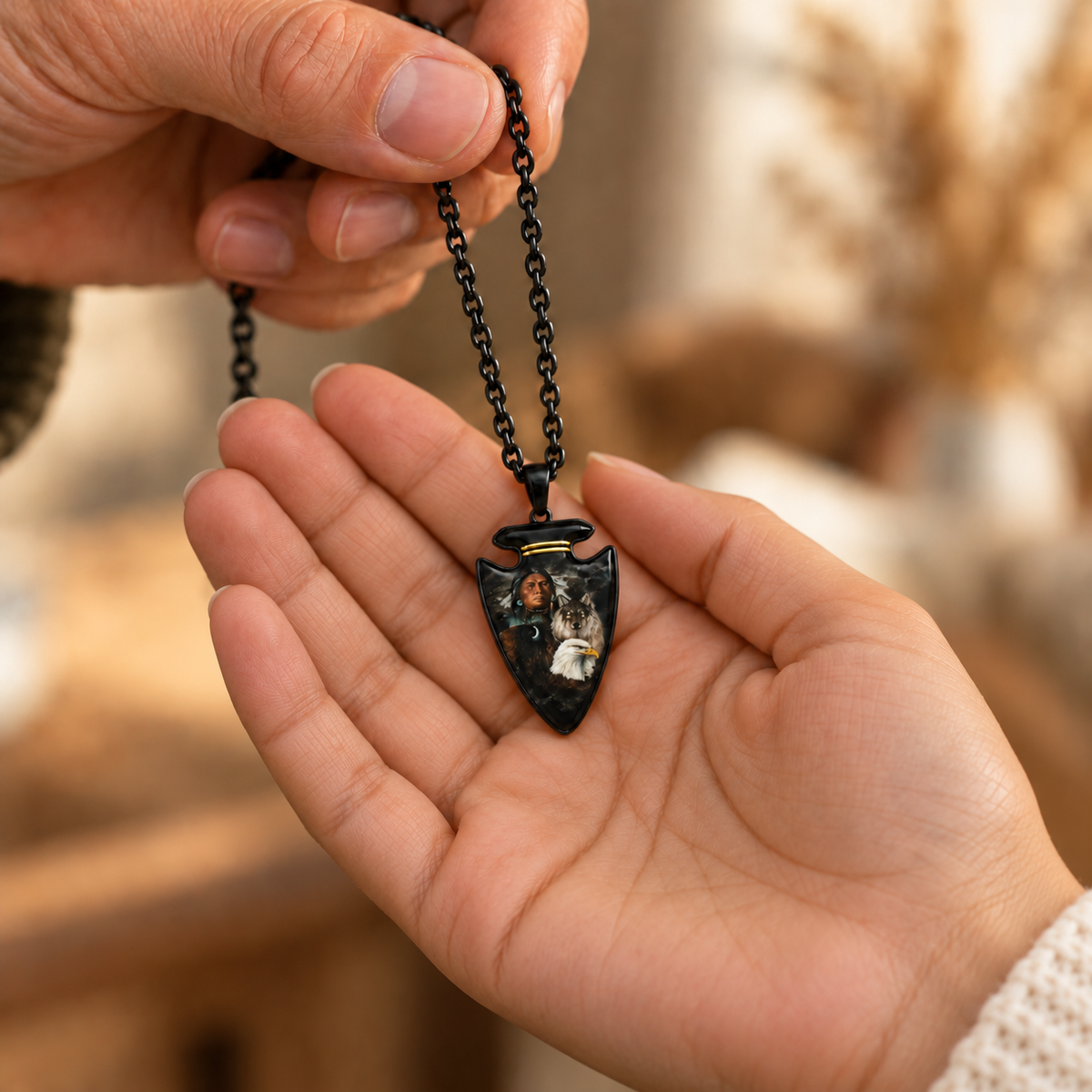 black arrowhead with native american, wolf and american eagle being given 