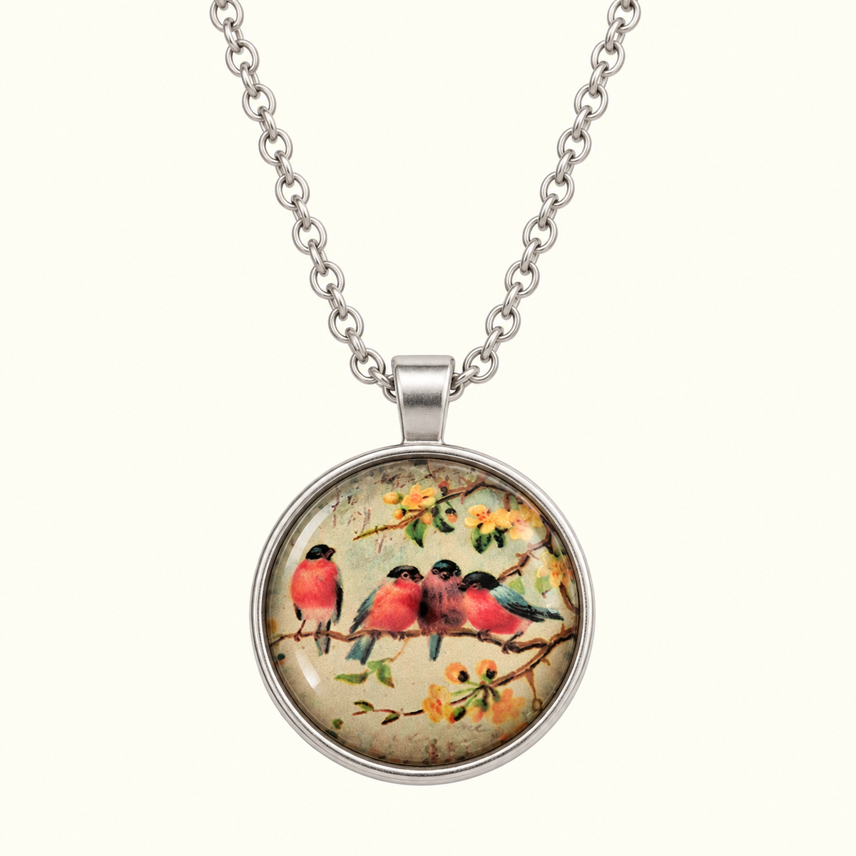image of a necklace with 4 red birds on a branch with yellow flowers