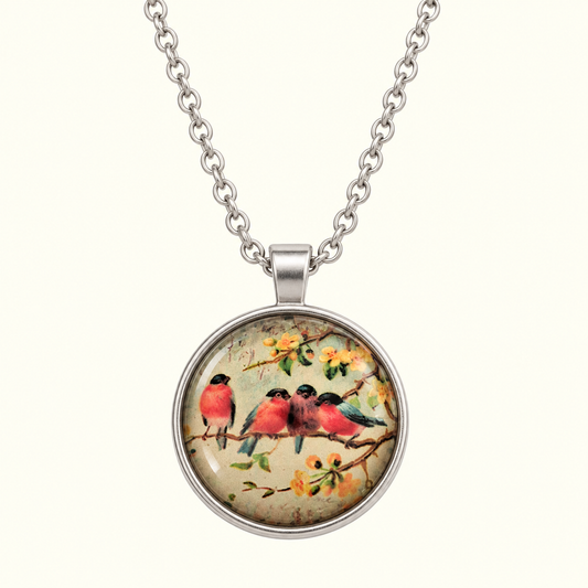 image of a necklace with 4 red birds on a branch with yellow flowers
