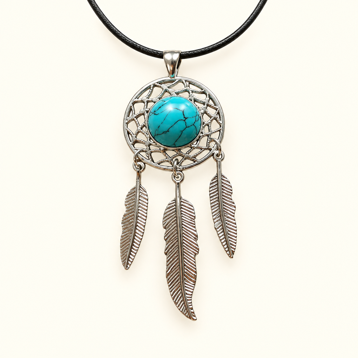 Silver-tone dreamcatcher necklace with a turquoise-colored center and three feather charms on a black cord.