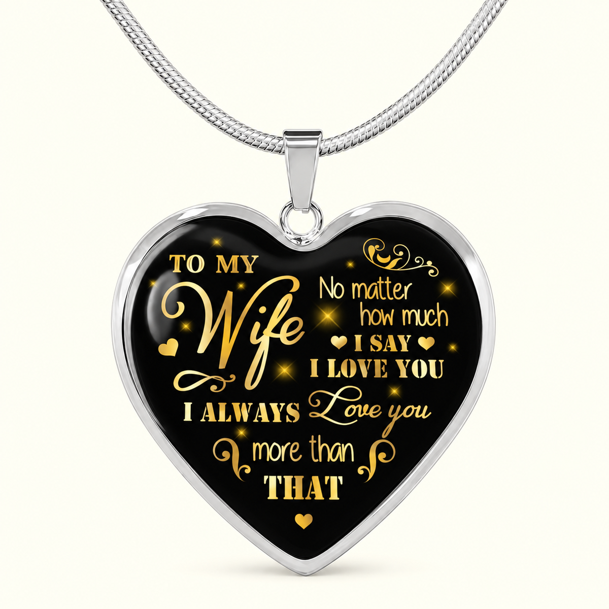 Wife necklace from husband with black-and-gold I love you more message